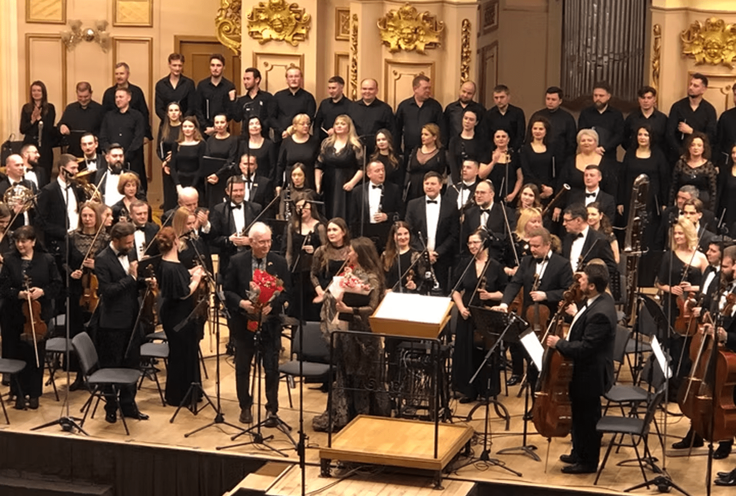 Classical concert ensemble on ornate stage