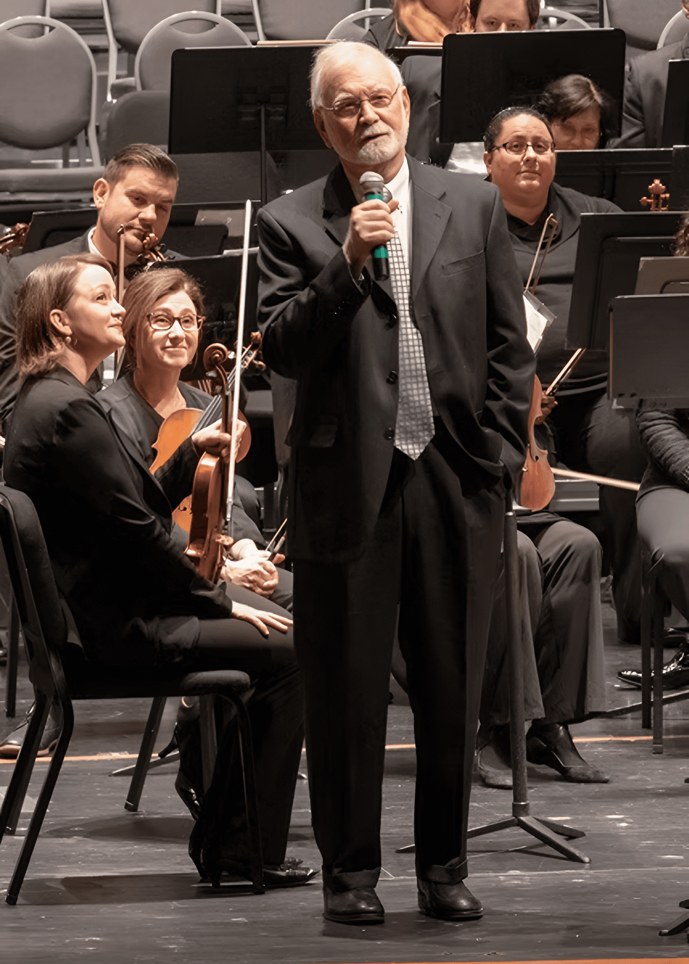 Man with microphone on stage