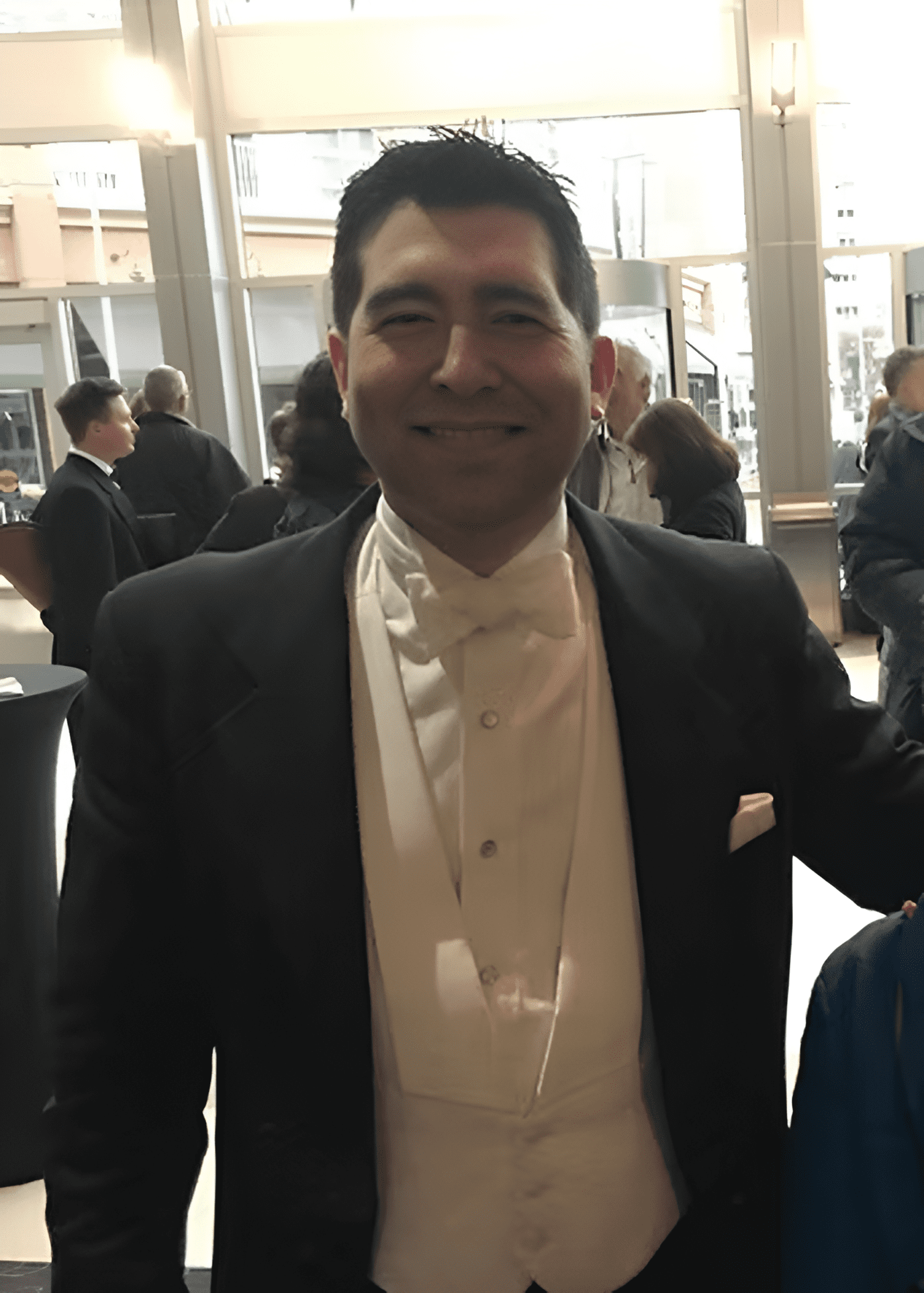 Elegant man in white tie outfit