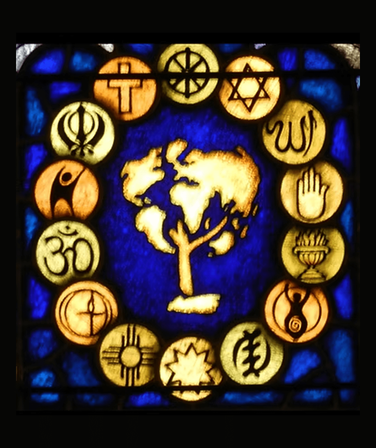 Multifaith symbols surrounding a tree design
